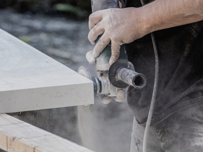 Man working on engineered stone