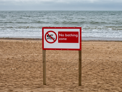 No Bathing Zone Sign On Exmouth Beach, Devon, United Kingdom Stock Photo (1)